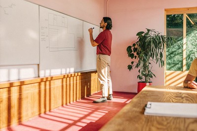 Athlete-entrepreneur planning on a whiteboard
