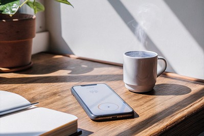phone timer set to five minutes on a clean desk