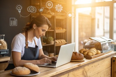 Vlasnica male pekare uz laptop i AI ikone