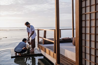 sunrise mangrove planting by a private villa jetty