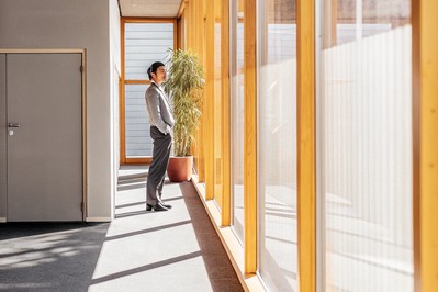 Leader pausing before tense meeting