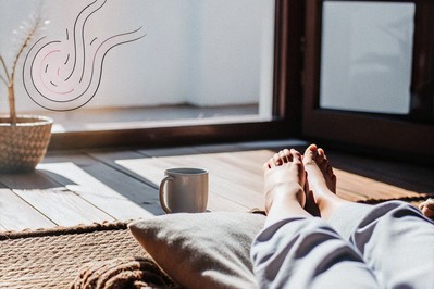 Person practicing slow exhale with grounded feet