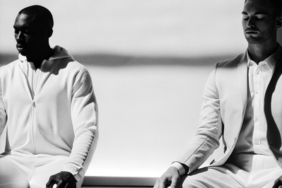 athlete and executive practicing breathwork with wearables